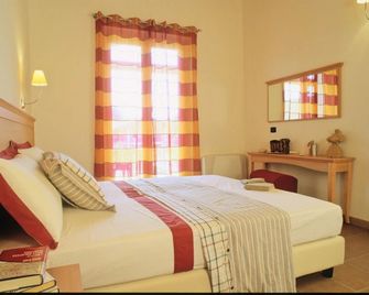 Residence Alice - Dormelletto - Schlafzimmer