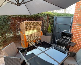 Dat Friesenhuus 2 for 4 persons in Aurich at the bathing lake! Pet friendly! - Aurich - Patio