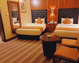 Royal Qatar Hotel - Doha - Habitación