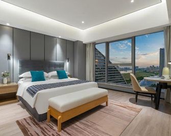 Lavender Garden, Howard Johnson International Hotel Kunming Flower City - קונמינג - חדר שינה