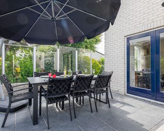 Private, 5-star vacation home on a beautiful island - De Cocksdorp - Innenhof