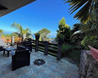 Maison cosy avec vue mer et jardin à Trois Bassins - Les Trois-Bassins - Patio