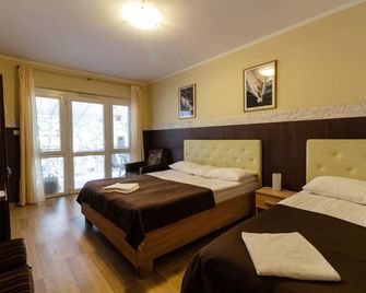 بيلا فيلا سيوفوك - Siófok - غرفة نوم