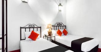 Hotel El Nito Posada - אואחאקה - חדר שינה
