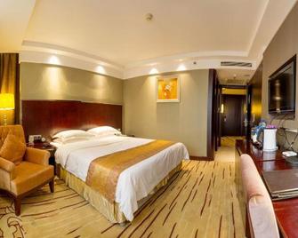 Eastern Kaiyue Business Hotel - Longyan - Habitación