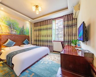 Luzhou Bali Nuo Hotel - Luzhou - Bedroom