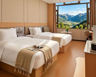 Lanze Hotel - Ngawa - Bedroom