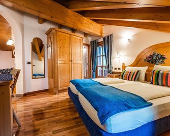 莫托利諾木屋旅館 - 利維尼奧 - 臥室