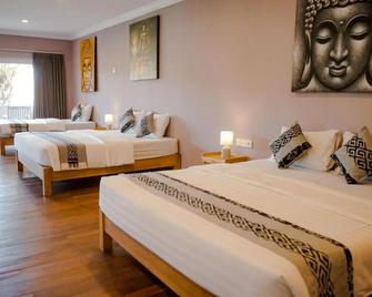 Coconut Lodge Resort - Jepara - Bedroom