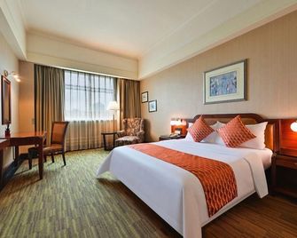 Zhongshan Sunshine Holiday Hotel (Zhongshan Pedestrian Street Xingzhong Plaza Store) - Zhongshan - Habitación