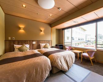 Livemax Resort Kaga Yamashiro - Kaga - Schlafzimmer