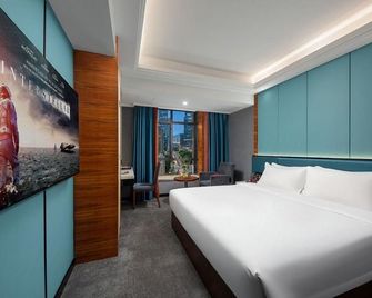 Huayi Hotel (Shenzhen North Railway Station) - Shenzhen - Bedroom
