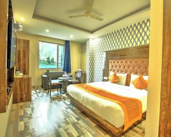 Hotel Smart Plaza By Smart Group - Niu Đê-li - Phòng ngủ