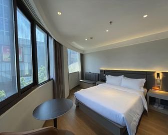Xinlian Hotel - נאנז'ינג - חדר שינה