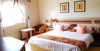 Axari Hotel & Suites - Calabar - Bedroom