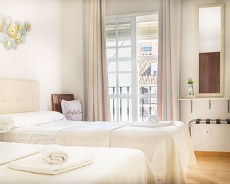 هوستال كويفاس - فوينخيرولا - غرفة نوم