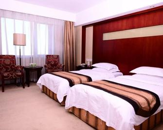 Heilongjiang Kunlun Hotel - Harbin - Bedroom