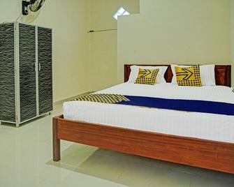 Spot On 92263 Penginapan Puncak Bobosan - North Indralaya - Habitación