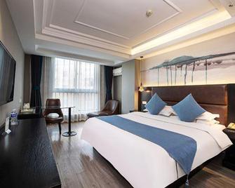 Kunlun Leju Hotel (Wenxian Branch) - Jiaozuo - Slaapkamer