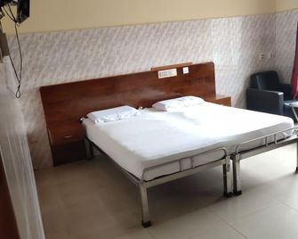 Spot On Ambika Residency - Kollur - Bedroom