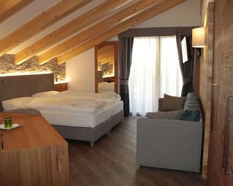 Wellness Hotel Lupo Bianco - Canazei - Slaapkamer