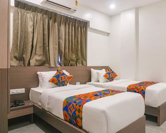 Fabhotel Prime Athiti Delight Stay - Poona - Slaapkamer