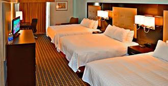 美洲最有價值酒店及套房 - 岩泉城 - 羅克斯普林 - 臥室