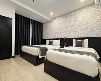 Lion 8 Hotel - Cần Thơ - Schlafzimmer