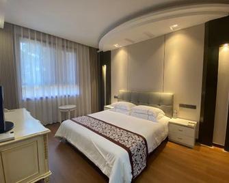 Huai An Hotel - Huai'an - Schlafzimmer