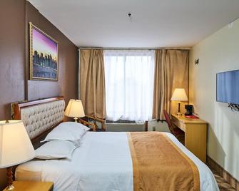 Flushing Hotel - קווינס - חדר שינה