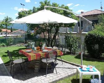 Lake Como - Comfortable and welcoming apartment with garden - Lenno - Patio