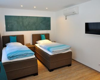 Apartments am Freizeitpark - Kriftel - Schlafzimmer