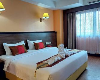 M Hotel Danok - Sadao - Bedroom