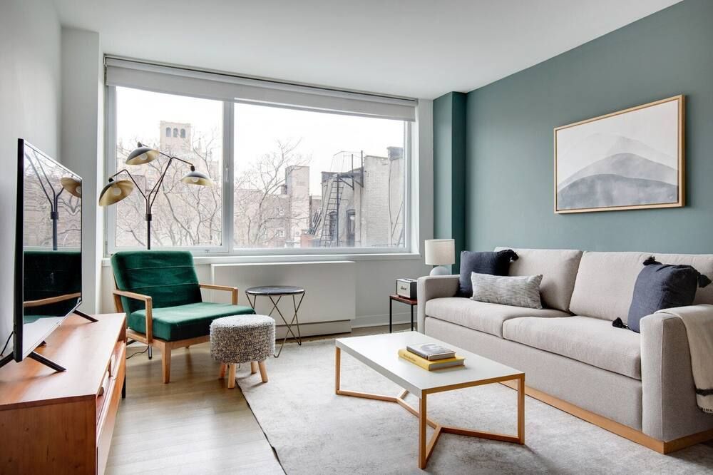 Hip East Village 1BR w/ Gym, W/D, Doorman, near Union Sq., by Blueground - Nueva York - Sala de estar