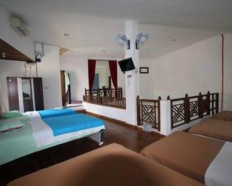 Palma Bed & Breakfast - Hostel - South Kuta - Bedroom