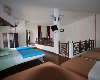 Palma Bed & Breakfast - South Kuta - חדר שינה