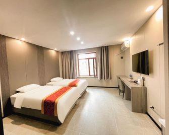 Zhenyue Hotel (Engineering University Branch) - Harbin - Bedroom