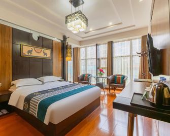 Tongxin Xi Hotel (Guiyang Happy World Dashandong) - Guiyang - Bedroom