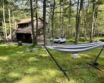 Lake escape sauna hot tub kayaks arcade griddle EV - Gouldsboro - Patio