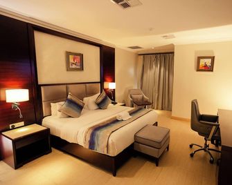 Grand Palace Hotel Lusaka - Lusaka - Schlafzimmer