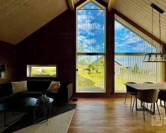 Cozy cabin on Sjusjølia by the trail network sauna - Sjusjøen - Living room