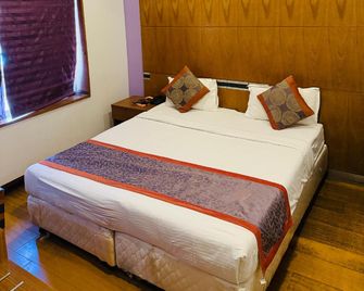 Medora Hotel - Kozhikode - Habitación