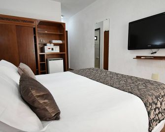 Hotel Akropolis - סרה נגרה - חדר שינה