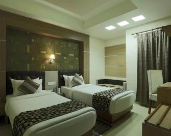 Hotel SJ International - Guwahati - Habitación