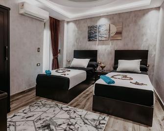 Pyramids Planet Hotel - Gizeh - Slaapkamer