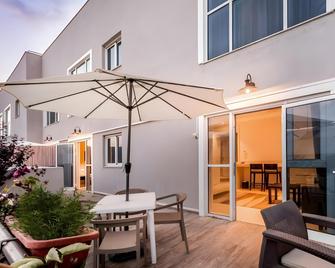 Olive Boutique Hotel Nahariya - Naharia - Binnenhof