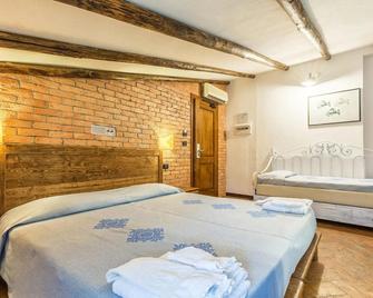 Hotel Santa Maria - Santa Maria Navarrese - Спальня