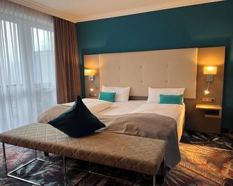 Appartementhotel Cura Bad Füssing - Bad Füssing - Schlafzimmer