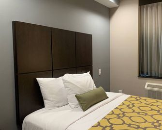 Voyage Hotel - Queens - Schlafzimmer
