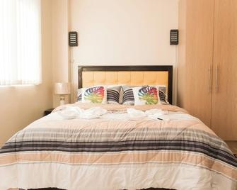 Comfy Studio Unitl @onemadison34 - Iloilo City - Schlafzimmer